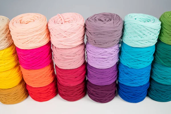 Rows of multicolored cotton yarn. The assortment of the store for needlework. — Stock Photo, Image