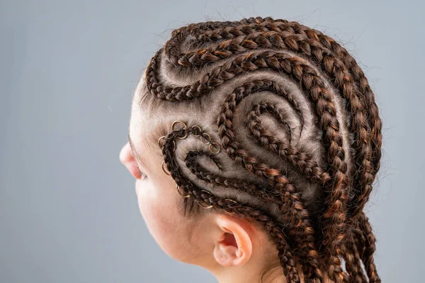 Close-up of braids on the head of a caucasian woman. — Stock Photo, Image