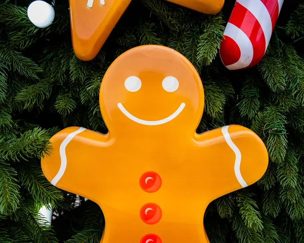 Close-up of decorations on the Christmas tree. Mister gingerbread. — Stock Photo, Image