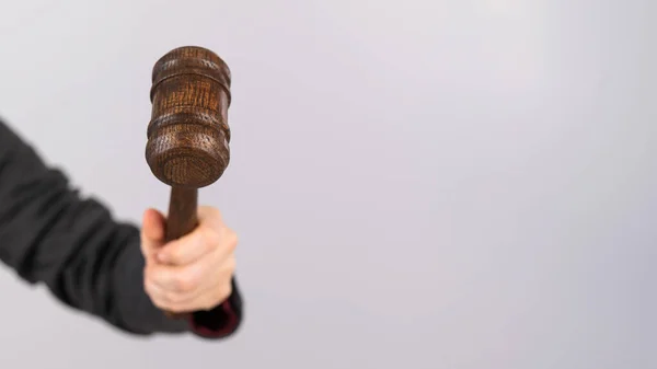 Woman holding judges gavel on white background. — Stock Photo, Image