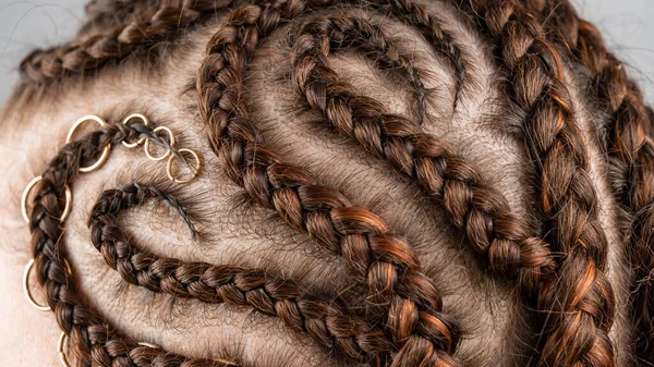 Close-up of braids on the head of a caucasian woman. — Stock Photo, Image