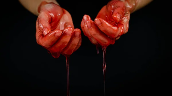 Womens hands in a viscous red liquid similar to blood. — Stock Photo, Image