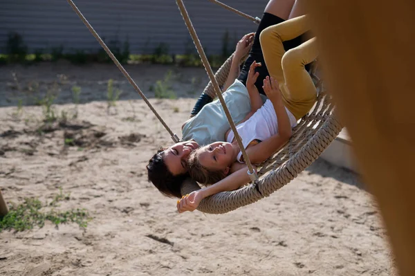 Mom Daughter Swing Swing Caucasian Woman Little Girl Have Fun — Stock Photo, Image