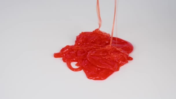Red Slime Flowing White Background — Stock Video