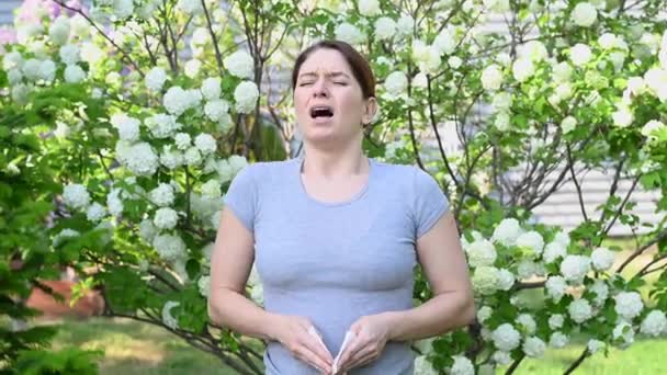 Caucasian Woman Suffers Allergies Sneezes While Walking Park — Stock Video