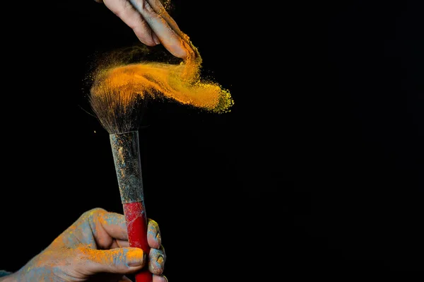 Woman Shaking Orange Powder Brush Black Background — Stock Photo, Image