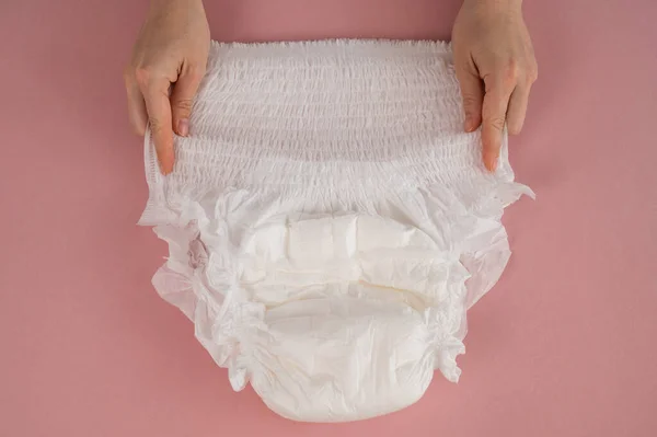 Woman Holds Adult Diaper Pink Background Incontinence Problems — Stock Photo, Image