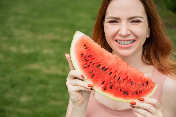 Beautiful Red Haired Woman Smiling Braces Eat Slice Watermelon Outdoors — Stock Photo, Image