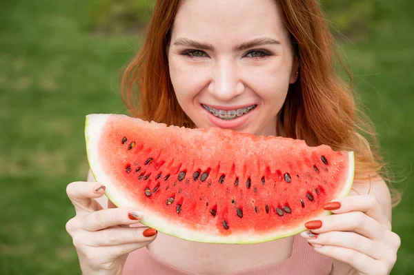 Beautiful Red Haired Woman Smiling Braces Eat Slice Watermelon Outdoors — Stock Photo, Image