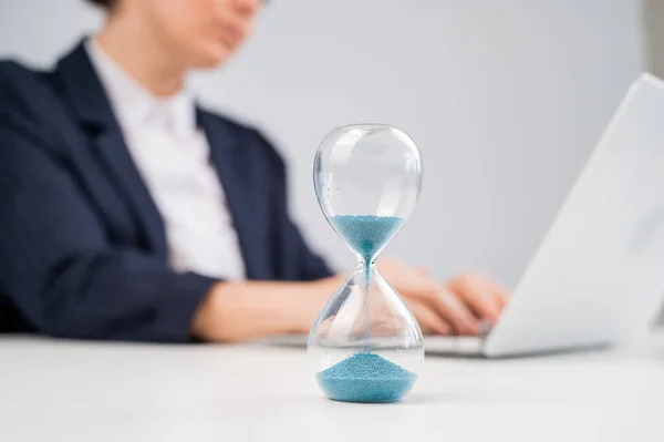 Business Woman Keeps Track Time Hourglass While Working — Stock Photo, Image