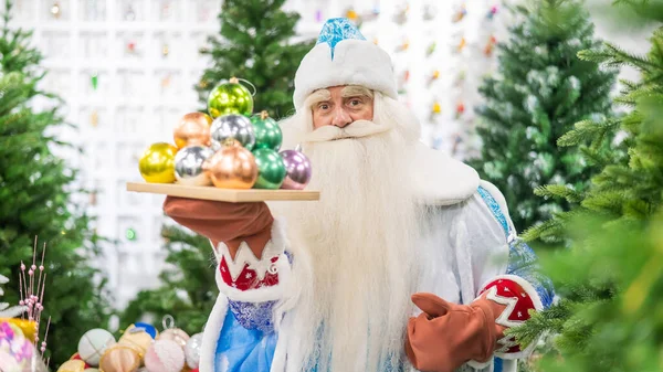 Russian Santa Claus Holds Decorations Christmas Tree Store — Stock Photo, Image