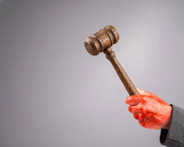 Female Judge Holds Gavel Bloody Hand White Background Copy Space — Stock Photo, Image