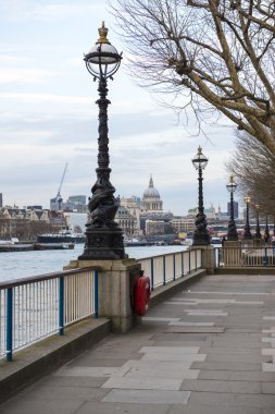 LONDON, UK - APRIL 17: Lamp posts lined pathway with Saint Paul'