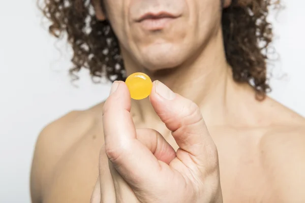 Man taking pill — Stock Photo, Image