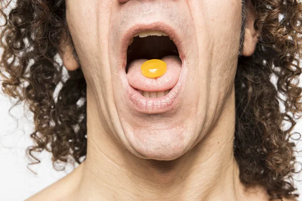 Man taking pill — Stock Photo, Image
