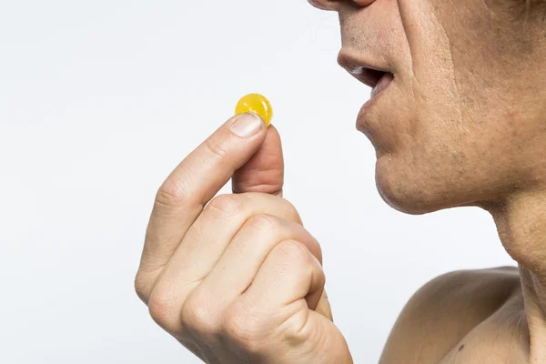 Man taking pill — Stock Photo, Image