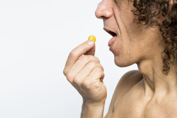 Man taking pill — Stock Photo, Image