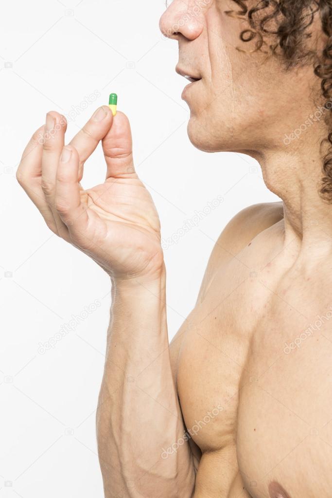 Man taking pill