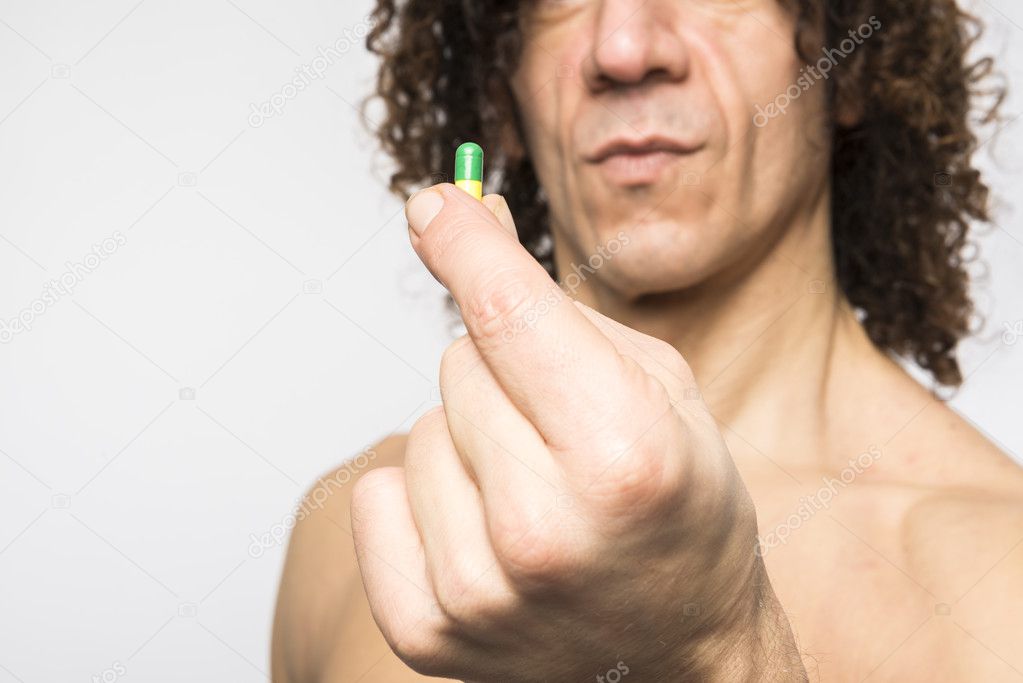Man taking pill