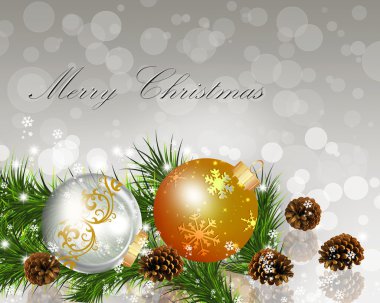 çam dalları ile Noel topları.