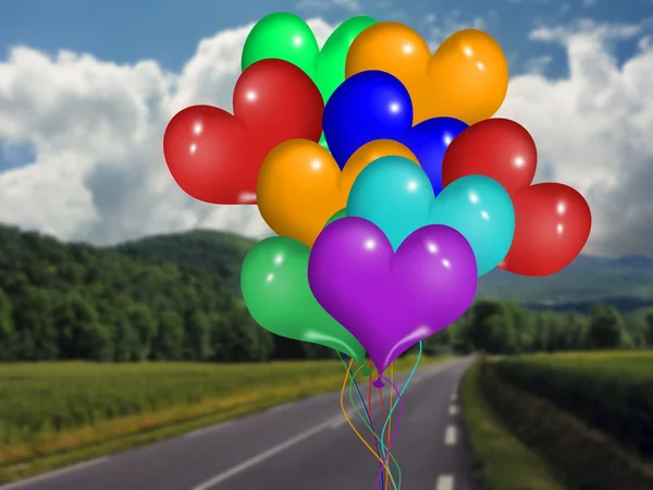 Heart balloon against a landscape, — Stock Photo, Image