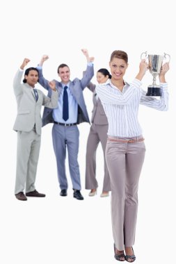 Woman holding a cup with dressed in suits acclaiming clipart