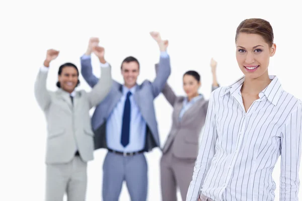 Close-up of a secretary smiling and business with the thu — Stock Photo, Image