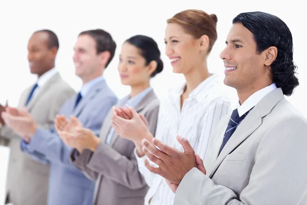 Close-up van gelukkig zakelijke applaudisseren — Stockfoto