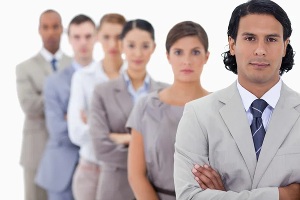 Big close-up of serious colleagues in a single line — Stock Photo, Image