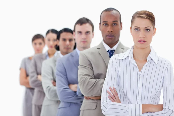 Close-up of serious dressed in suits crossing their arms — Stock Photo, Image