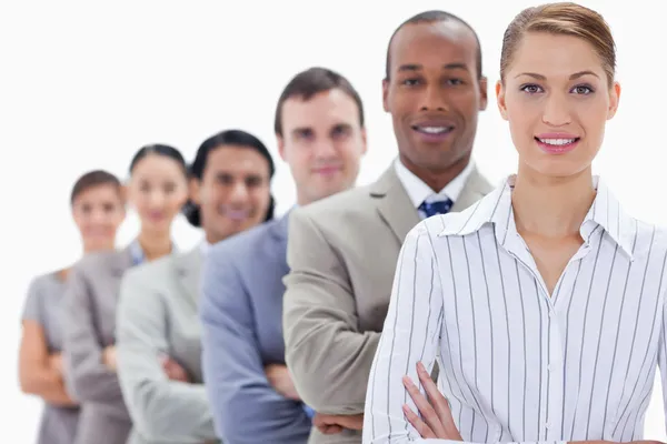 Close-up of a business team crossing their arms in a single line — Stock Photo, Image