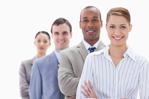 Close-up de uma equipe de negócios sorrindo em uma única linha — Fotografia de Stock