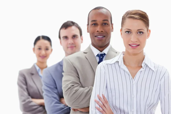 Close-up of colleagues in a single line crossing their arms — Stock Photo, Image