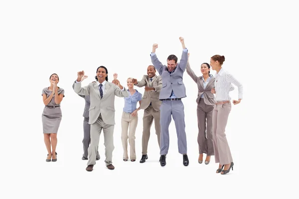 Very enthusiast jumping and raising their arms — Stock Photo, Image