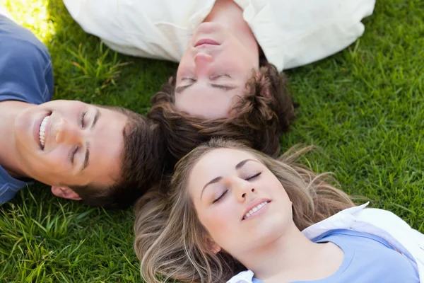 Three students resting together — Stock Photo, Image