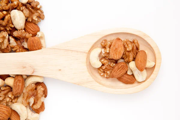 Cuchara de madera con nueces —  Fotos de Stock