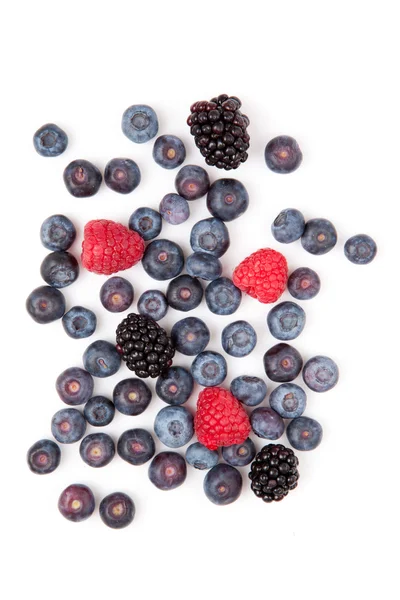 Raspberries and blueberries and blackberries — Stock Photo, Image