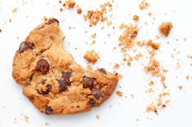 Close up of an half eaten cookie with crumb clipart