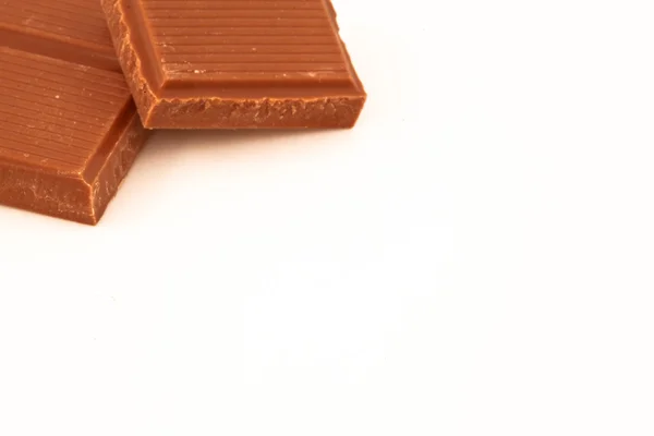 Dva kusy mléčné čokolády — Stock fotografie