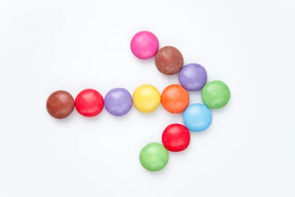 Arrow of candies — Stock Photo, Image