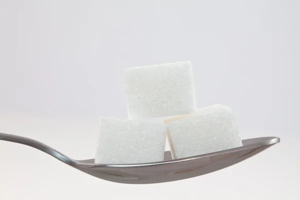 Spoon with sugar — Stock Photo, Image