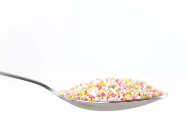 Sprinkles in a spoon — Stock Photo, Image