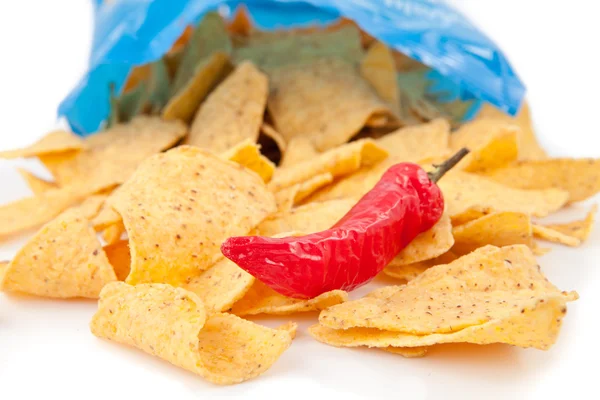 Open bag of crisps with a red pimento — Stock Photo, Image