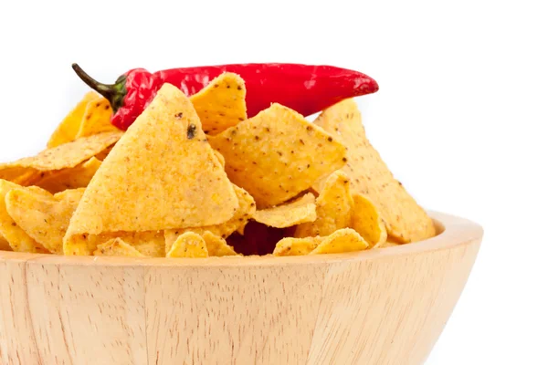 Pepper upon a bowl full of crisps — Stock Photo, Image