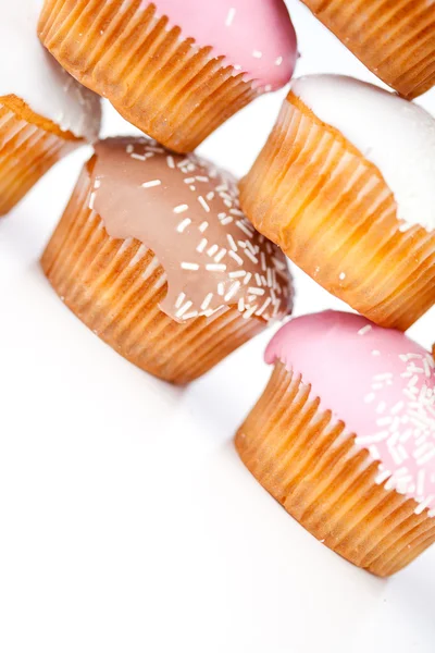 Close up on many muffins with icing sugar — Stock Photo, Image