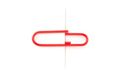 Red paperclip paperclip attaching on paper clipart
