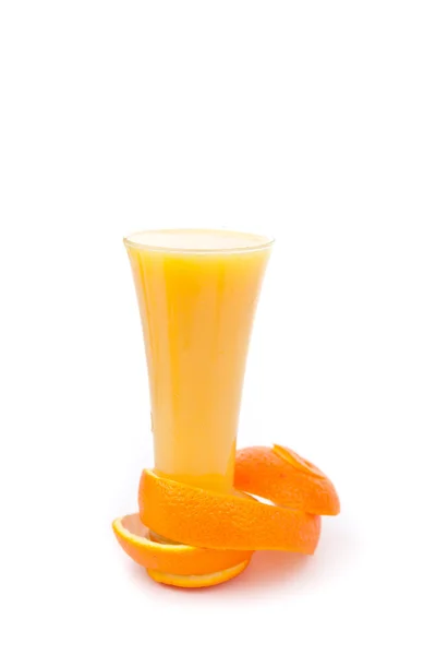 Orange peel at the base of a full glass — Stock Photo, Image