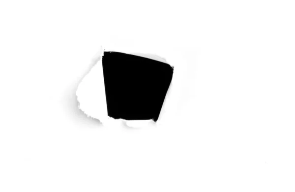 Small hole in paper — Stock Photo, Image