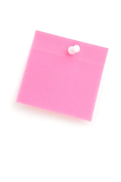 Close up of a pink adhesive note with pushpin — Stock Photo, Image