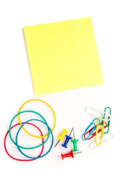 Stationery whose pushpins elastics paperclips adhesive notes — Stock Photo, Image